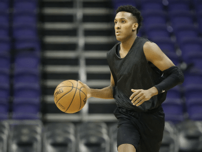 Basketball player practices to play in an overseas basketball league